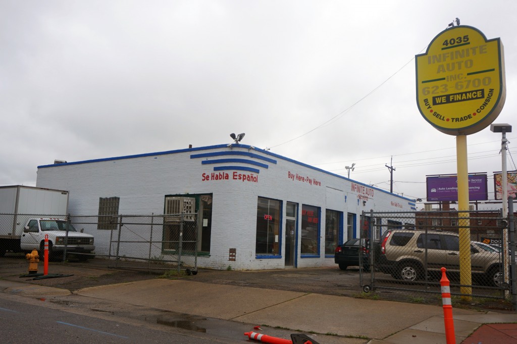 The current home of a car dealership will soon make way for new apartments. Photo by Burl Rolett.