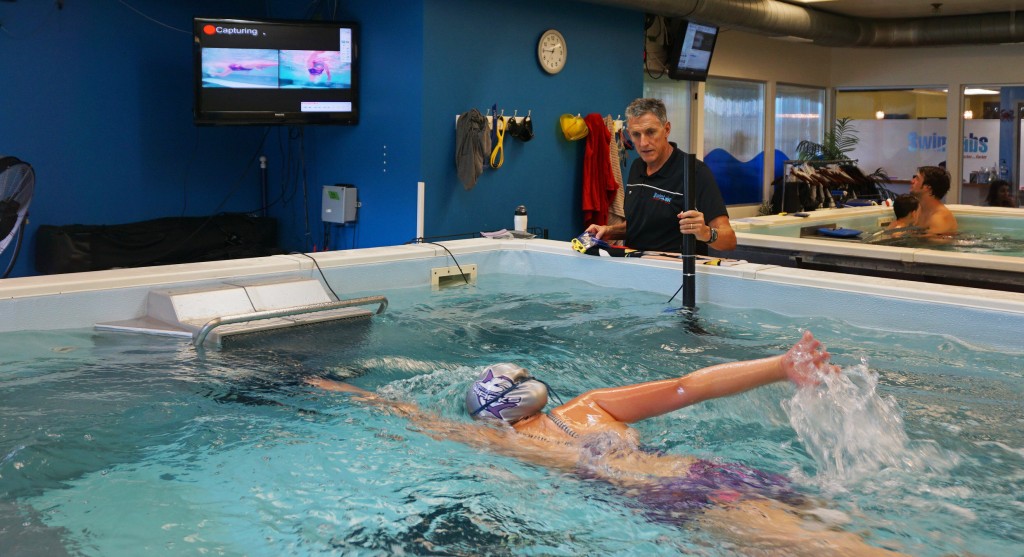 Mike Mann watches a student at SwimLabs in Highlands Ranch. Photos by George Demopoulos.