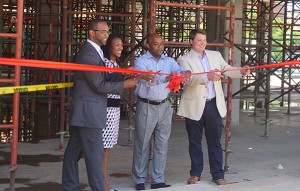 left to right: Albus Brooks, city councilman; Tracy Winchester, Executive Director of the Five Points Business District; Michael Hancock, mayor; Paul Books, developer.