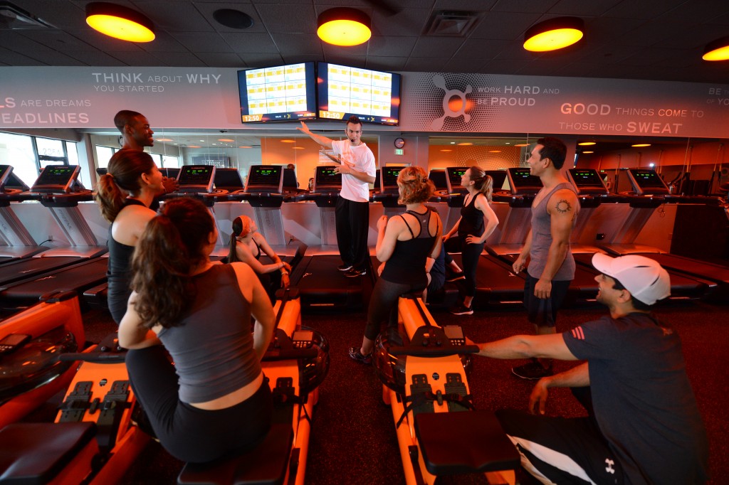 Orangetheory members monitor their heart rates on TV screens. Photos courtesy of Orangetheory.