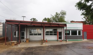 The storefront, a former scooter shop, is being renovated. 