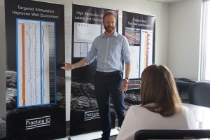 Josh Ulla, director of business development at Fracture ID, presenting to a group of the startup’s employees. (Amy DiPierro)