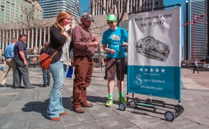 Employees roll the ads through 16th Street. (Courtesy of Chumba Media)