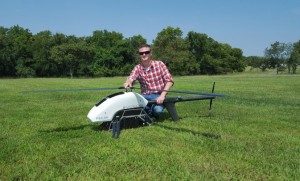 Director of training Tyler Sautter with a Pulse aircraft. (Courtesy Juniper Unmanned)