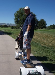 Andy Mills, an area realtor and patron of Raccoon Creek golf course, tries out the Golf Board. (Rob Melick)