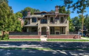 The four-story home at 992 South Franklin St. sits in a corner lot on the east side of Washington Park.