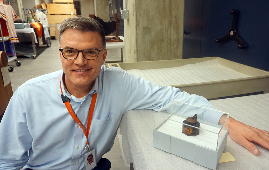 Executive director Steve Turner showcases the inkwell used to sign the surrender documents ending the Civil War. (Kate Tracy)