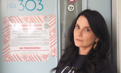 Christina Eisenstein outside a door