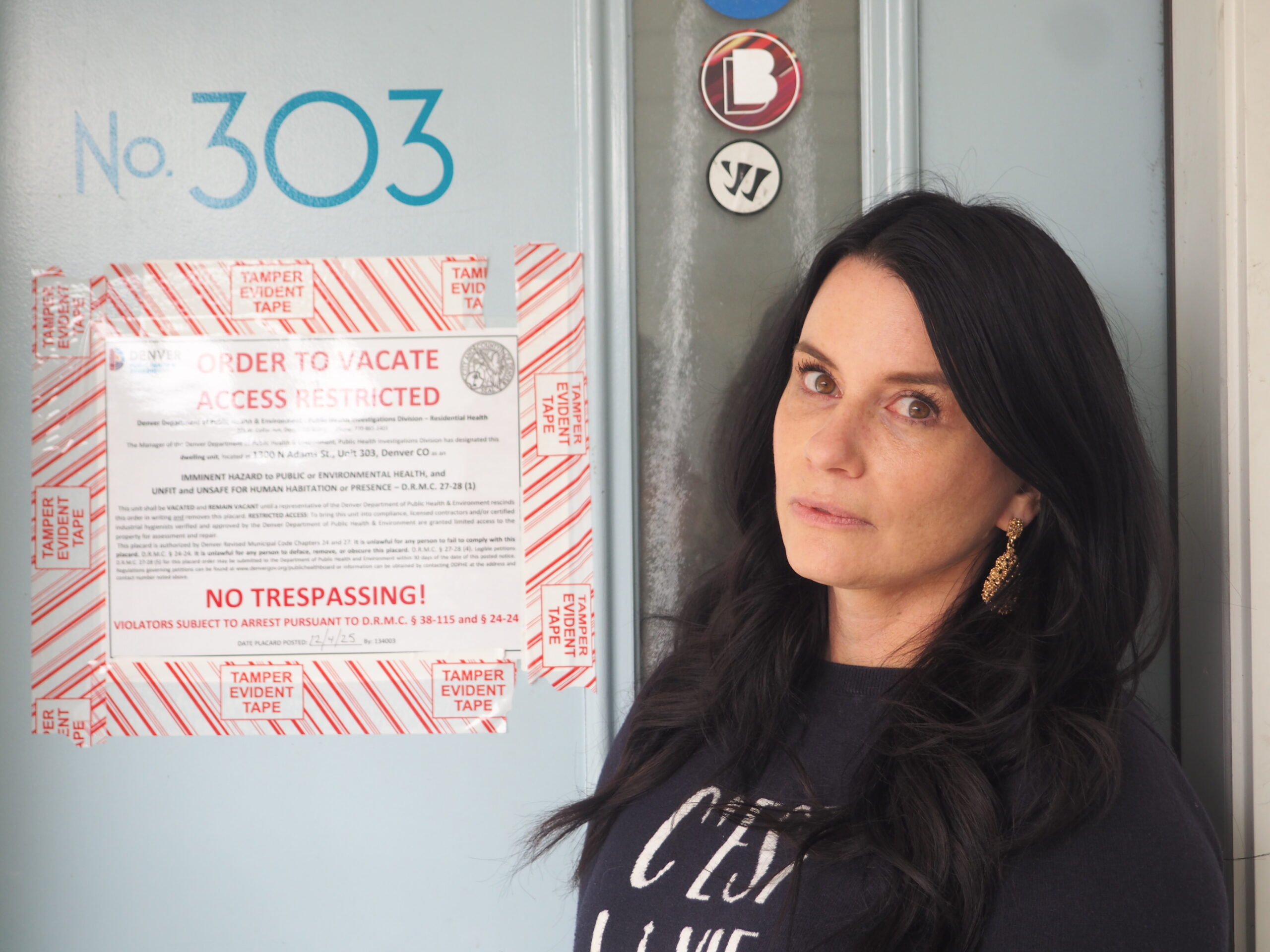 Christina Eisenstein outside a door
