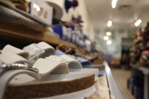 Maui wildfire victim, newly widowed, struggles to keep 16th Street Mall shop going 7 aloha birk collec