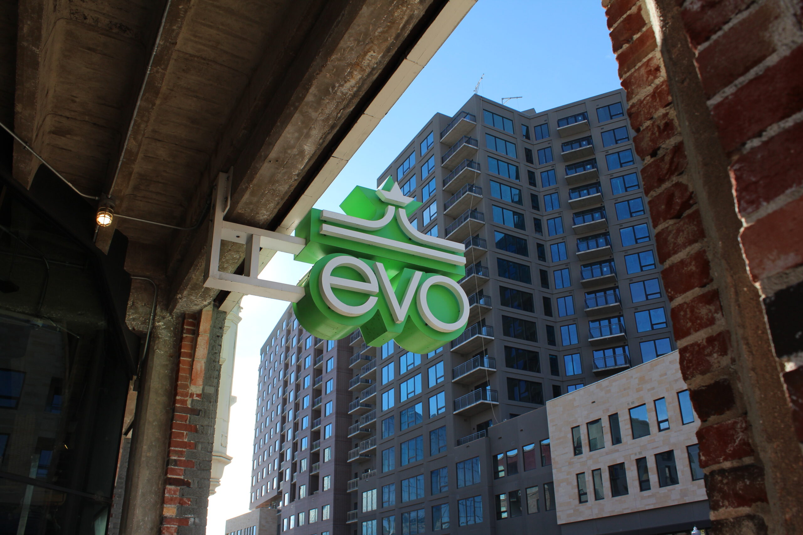 Ski and bike shop Evo looks to take over Sports Castle 2 evo logo
